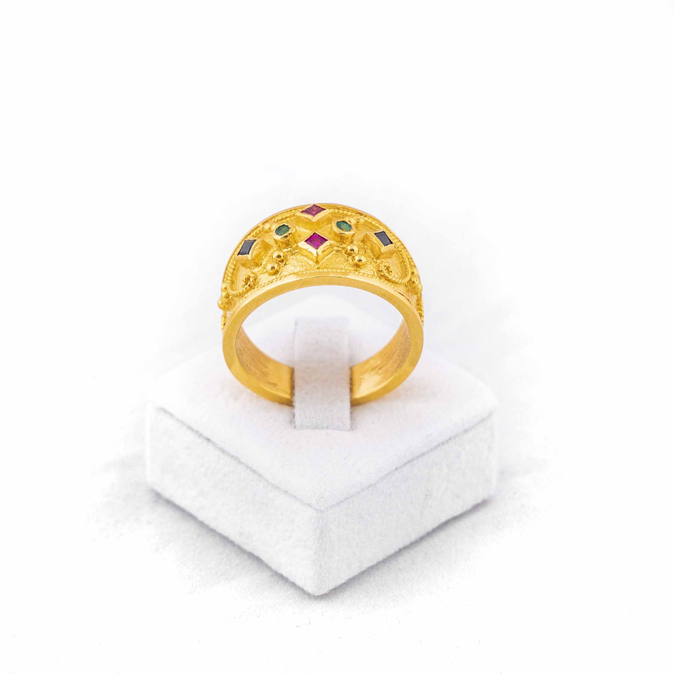 Ring handmade in yellow gold K18 (750) with rubies, sapphires and emeralds stones.