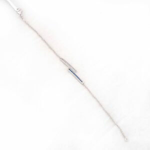 Bracelet in white gold K14 (585) with zircons stones and sapphires stones 0.18 carats.